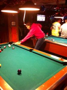 Stacy playing pool on NYE